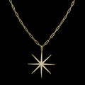 Black pave starburst necklace with paperclip chain: Gold